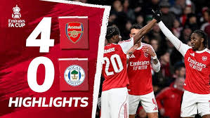 Arsenal Scored Four Goals In The Opening 30 Minutes As They Cruised Past Wigan To Reach The FA Cup Fifth Round For The First Time In Six Years.